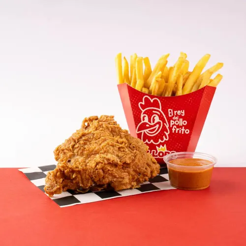 1 Pieza de Pollo Frito + Acompañamiento